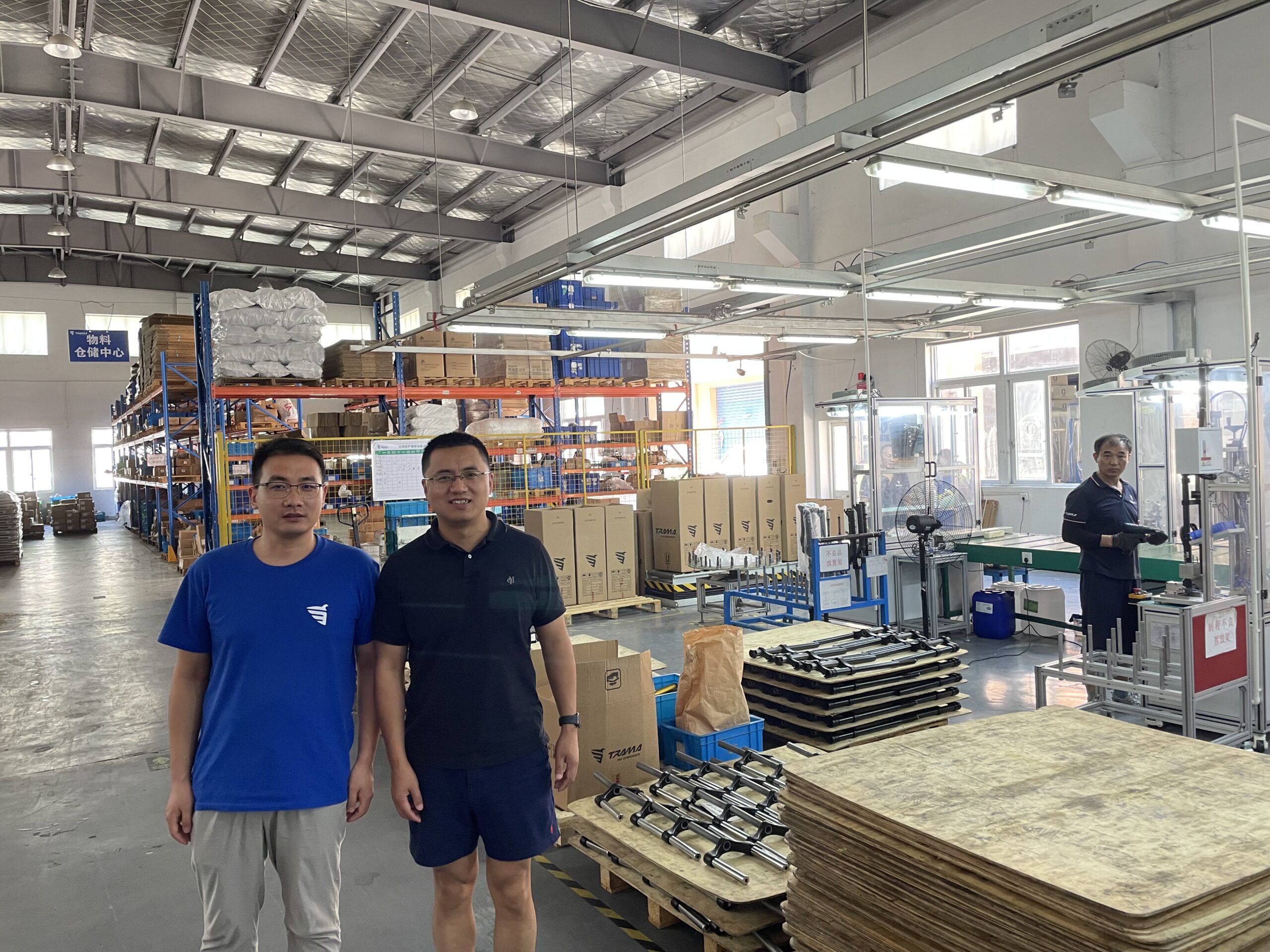 Ryan Link visiting a bicycle components factory in China