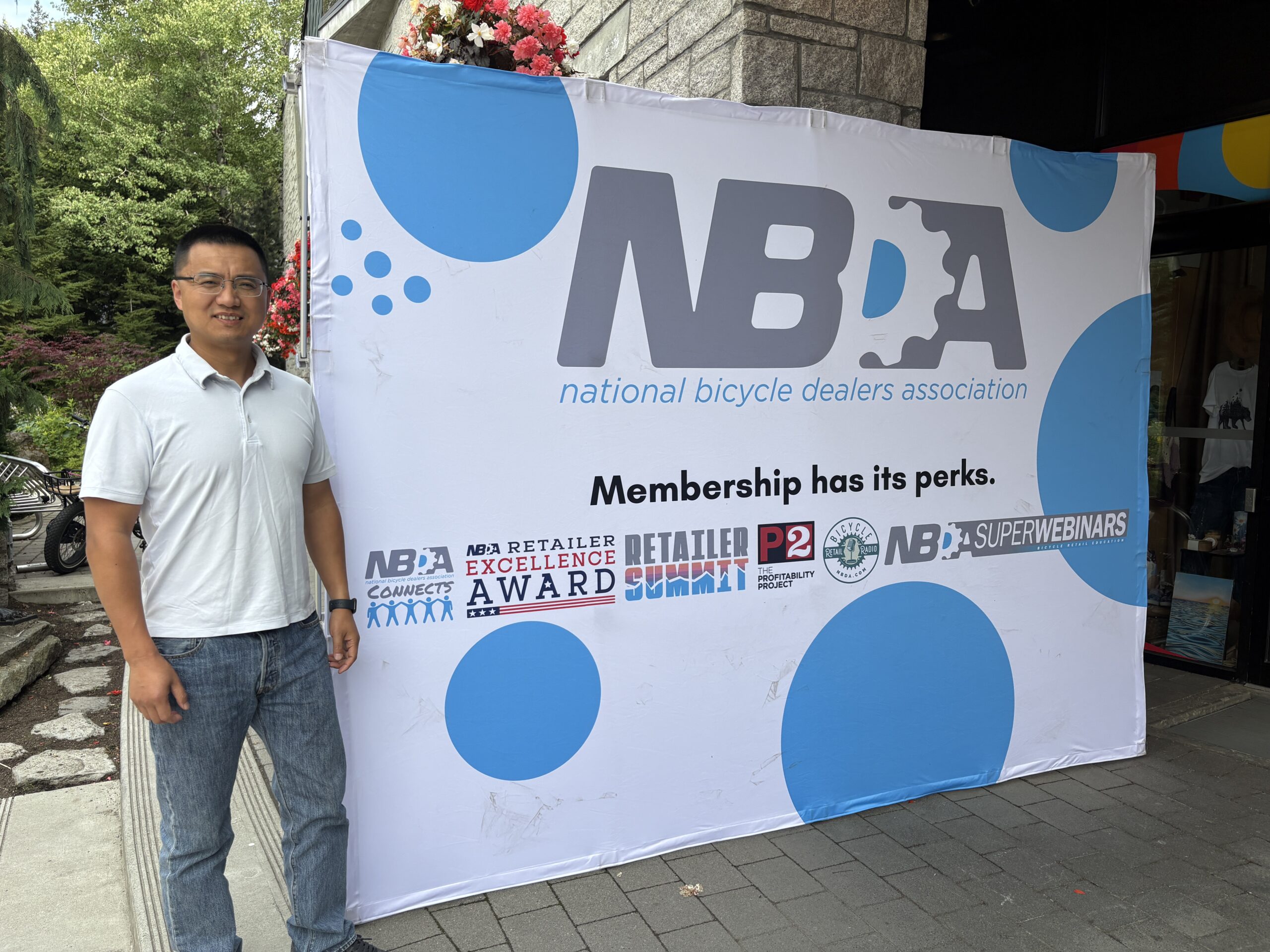 Wenhuan Zhang attending a Canadian bicycle industry event